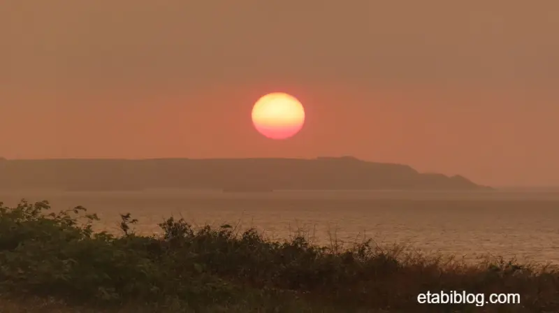プチホテルコリンシアンのバルコニーから見た夕日